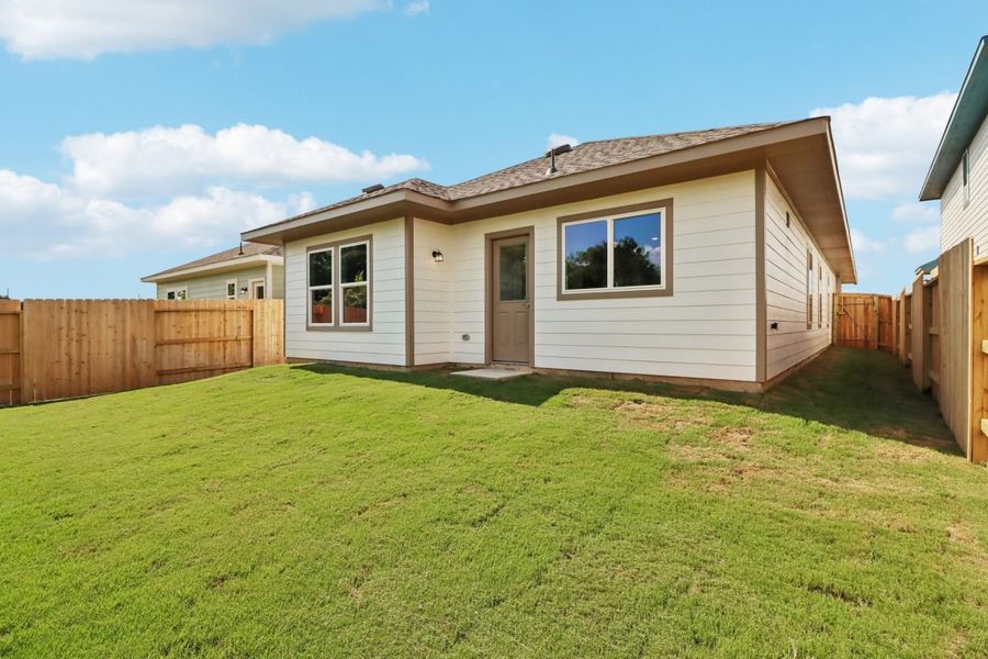 Exterior details and patio area of a home in Mustang Meadows, Waller (Image 3).