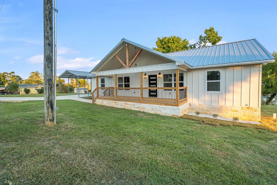 Exterior details and patio area of a home in , Point Blank (Image 25).