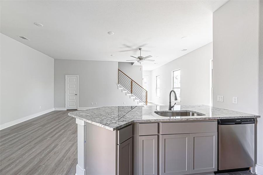 Open kitchen to living & dining area is great for entertaining