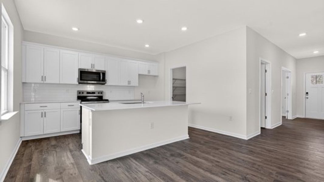 Furnished interior view inside a new home in Shahbain Reserve, Raeford (Image 8).