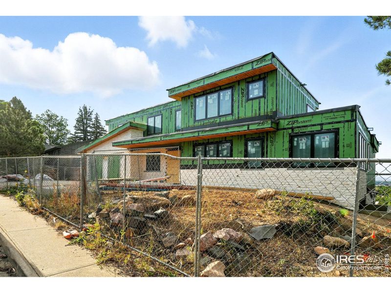 Front exterior of a new home in , Boulder, CO, highlighting curb appeal (Image 20).