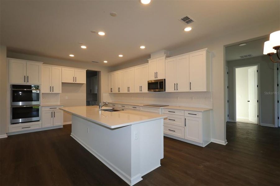 Furnished interior view inside a new home in Hawk's Overlook, Oviedo (Image 7).