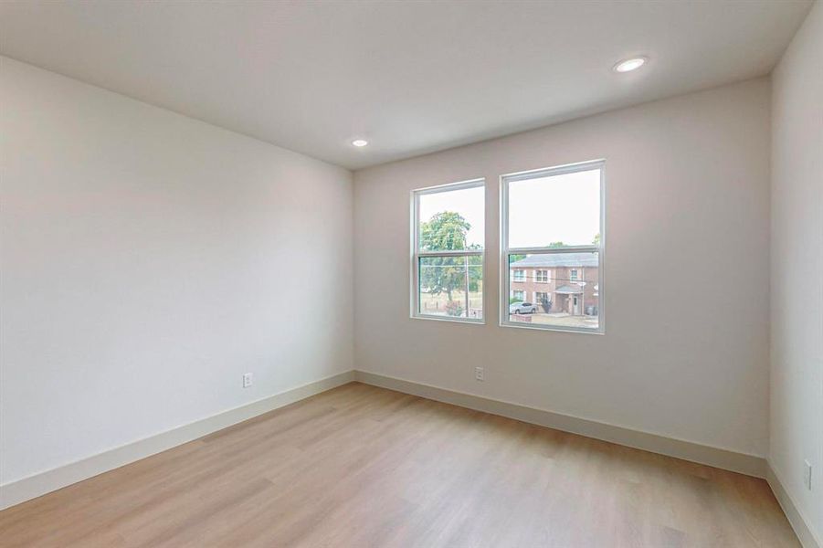 Spare room with light hardwood / wood-style floors