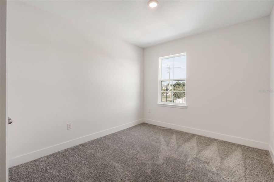 Spacious, unfurnished interior of a new home in Magnolia Reserve, Ocoee (Image 19).