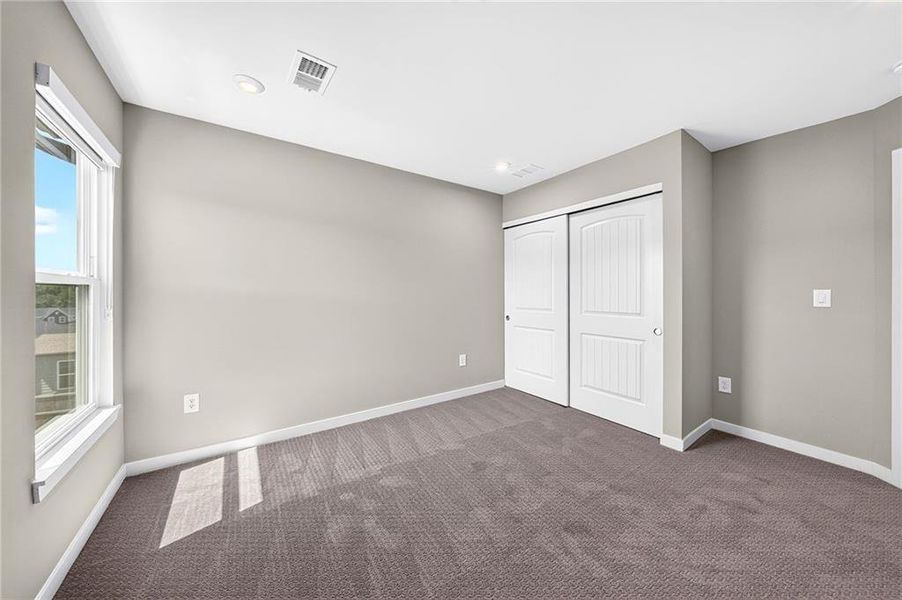 Spacious, unfurnished interior of a new home in The Reserve At Liberty Park, Braselton (Image 37).