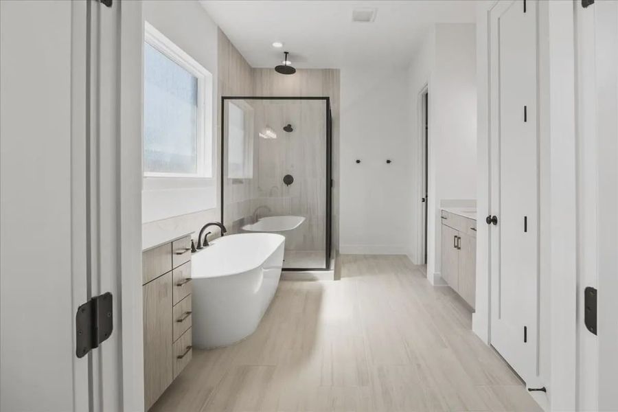 Representative furnished interior of a home built from the Courtney by Chesmar Homes in 6 Creeks, Kyle (Image 5).