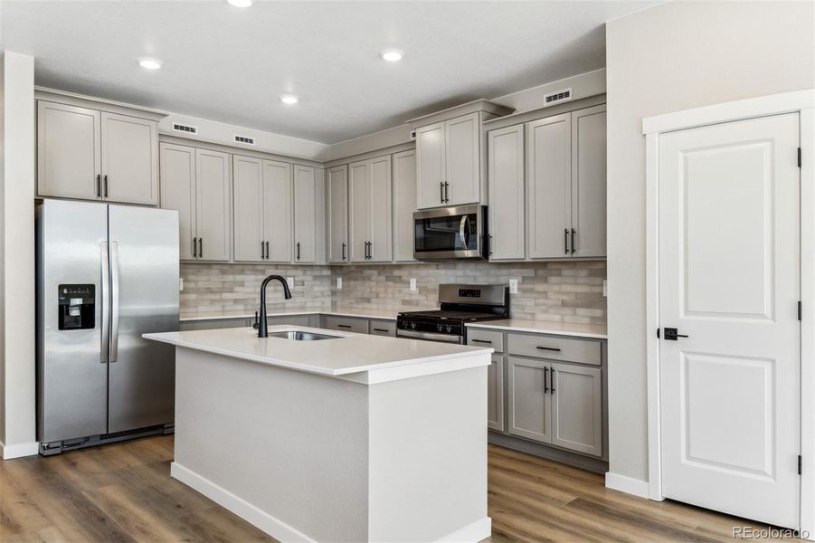 Furnished interior view inside a new home in Second Creek Farm, Commerce City (Image 7).