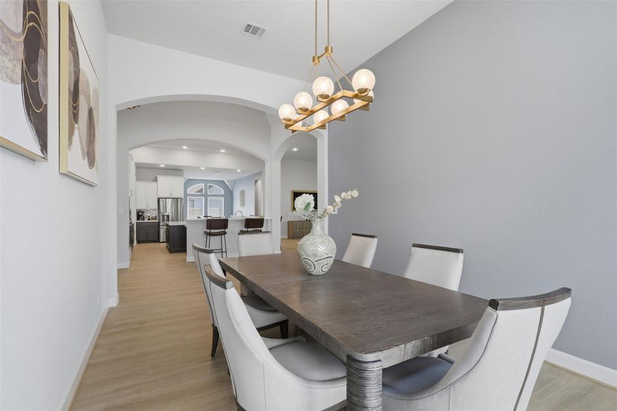 Elegant formal dining space offers plenty ofroom for hosting families and guests. Elegant formal dining space offers plenty ofroom for hosting families and guests.
