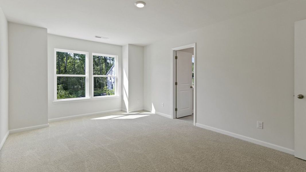Spacious, unfurnished interior of a new home in Copper Run South, Durham (Image 17).