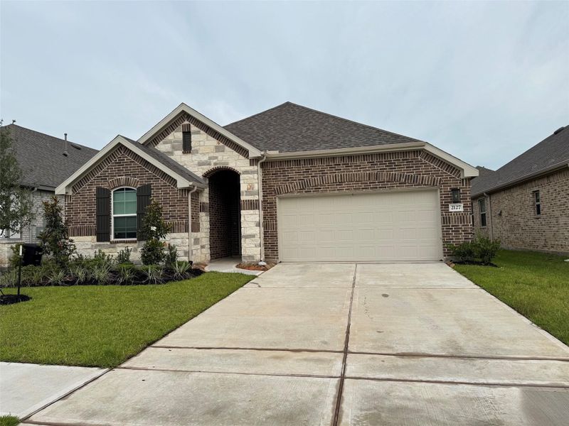 Spacious driveway and attached 2 car garage provide plenty of parking and everyday convenience. Spacious driveway and attached 2 car garage provide plenty of parking and everyday convenience.