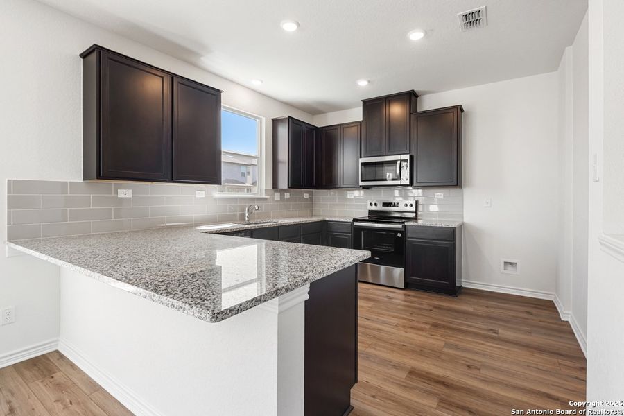 Furnished interior view inside a new home in Knox Ridge, Converse (Image 5).