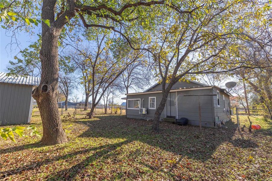 Exterior details and patio area of a home in , Brownwood (Image 21).