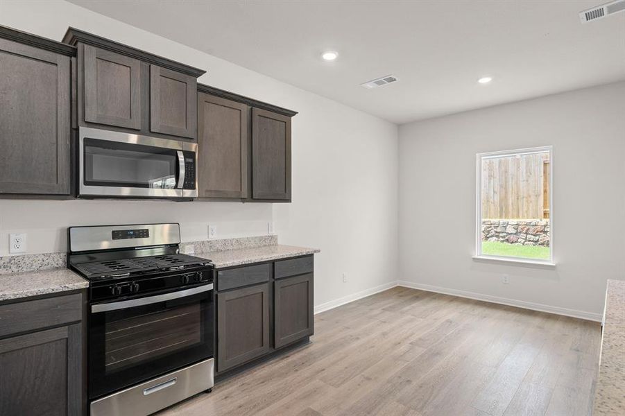 Furnished interior view inside a new home in Patriot Estates, Venus (Image 7).