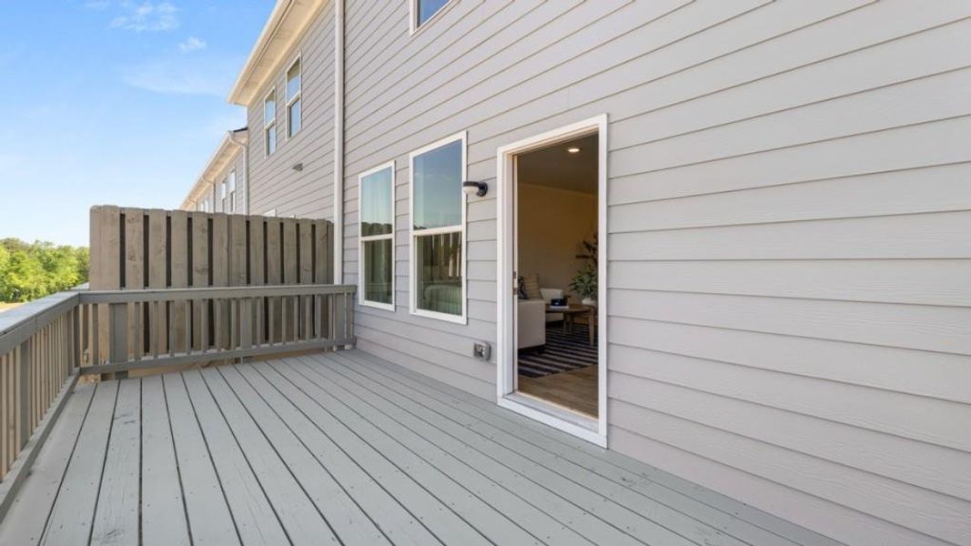 Exterior details and patio area of a home in Waypoint, Flowery Branch (Image 2).