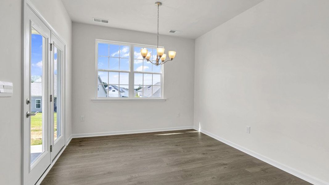 Representative unfurnished interior of a home built from the BRISTOL by D.R. Horton in The Villas at Galvins Ridge, Sanford (Image 23).