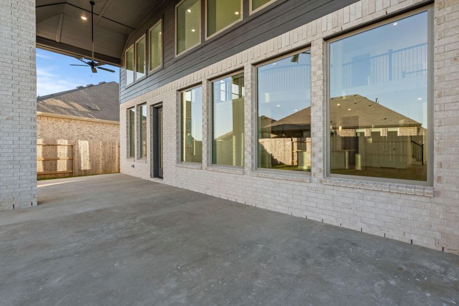 Exterior details and patio area of a home in Coastal Point, League City (Image 4).