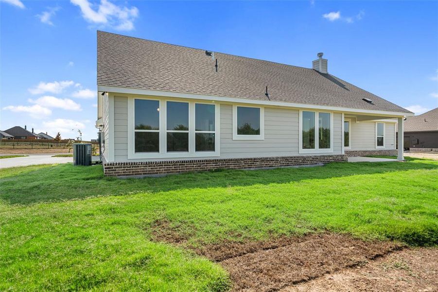 Front exterior of a new home in Fairview Meadows, New Fairview, TX, highlighting curb appeal (Image 17). Front exterior of a new home in Fairview Meadows, New Fairview, TX, highlighting curb appeal (Image 17).