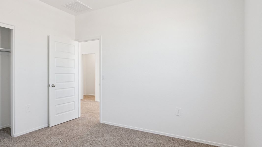 Representative unfurnished interior of a home built from the Ibis by D.R. Horton in Elena Trails, Maricopa (Image 30).