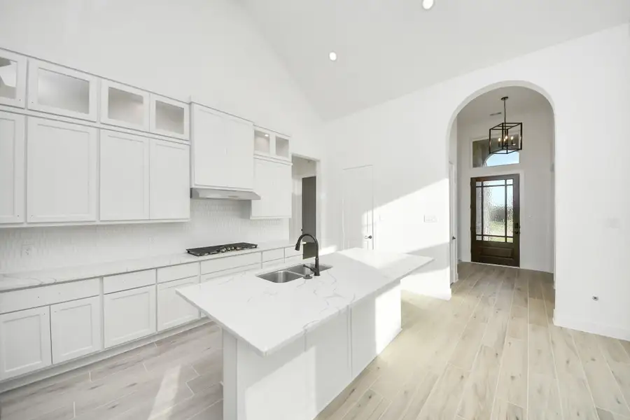 Furnished interior view inside a new home in Meridiana, Manvel (Image 12).