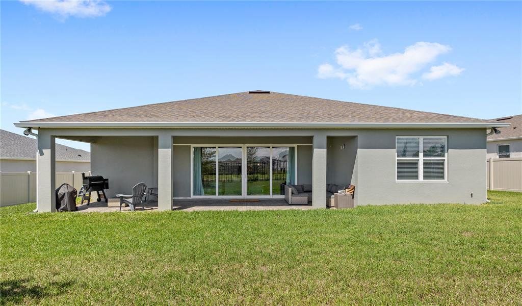 Exterior details and patio area of a home in , Mount Dora (Image 22).