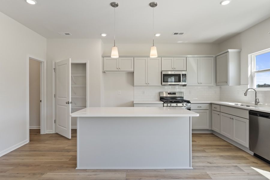 Furnished interior view inside a new home in Richmond Hill, Inman (Image 5). Furnished interior view inside a new home in Richmond Hill, Inman (Image 5).