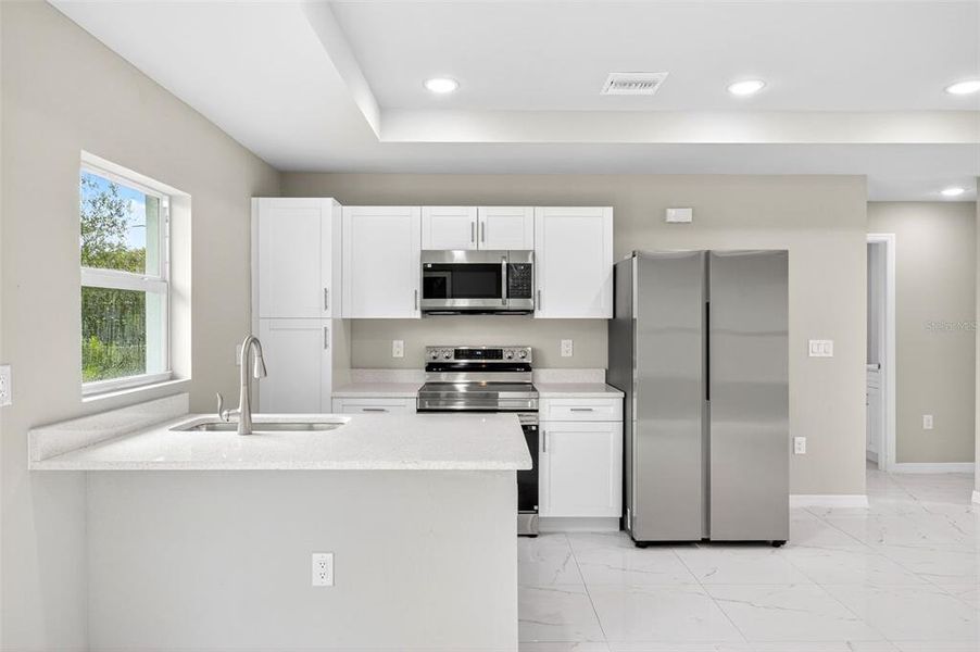 Furnished interior view inside a new home in , Lehigh Acres (Image 7).