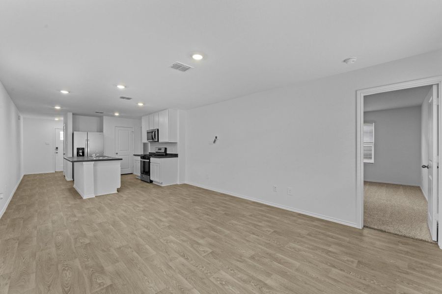 Spacious, unfurnished interior of a new home in Wayside, Uhland (Image 18). Spacious, unfurnished interior of a new home in Wayside, Uhland (Image 18).