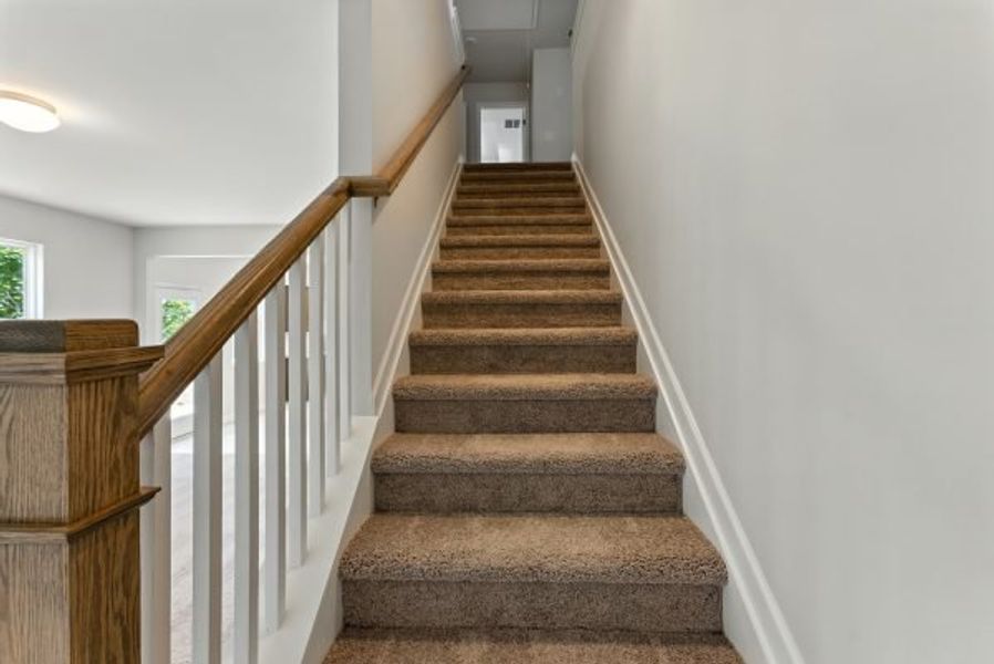 Representative unfurnished interior of a home built from the Brentwood by Piedmont Residential in Falls Creek, Flowery Branch (Image 23).