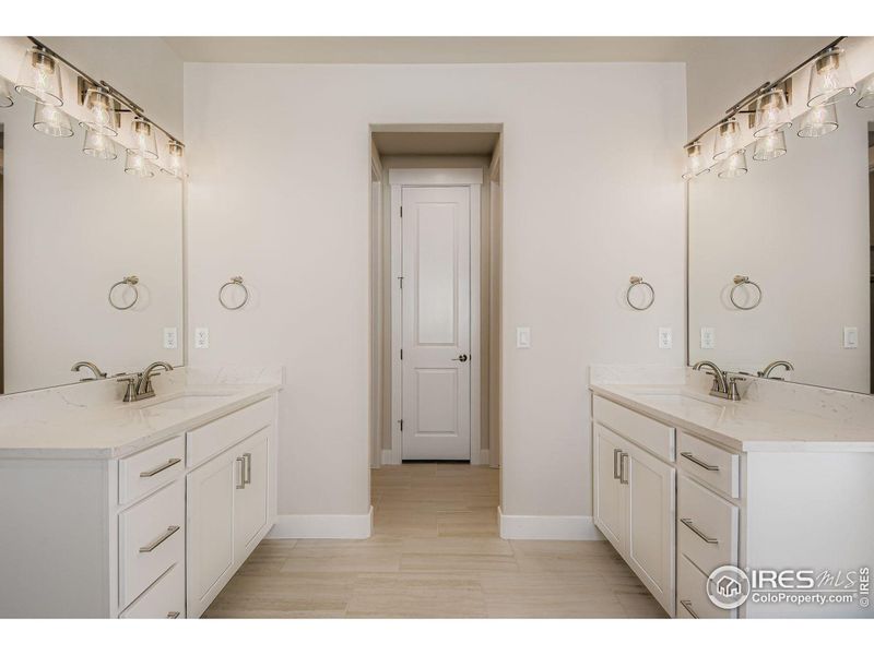 Furnished interior view inside a new home in RainDance National 60/70, Windsor (Image 10).