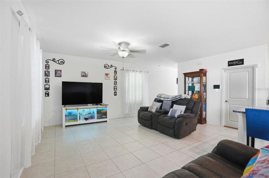 Furnished interior view inside a new home in The Isle of Avalon, Spring Hill (Image 17).