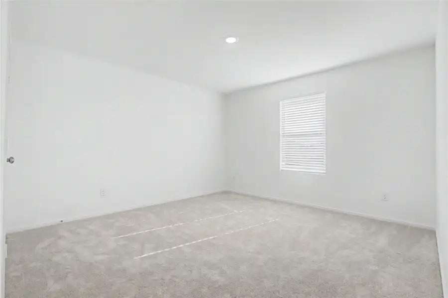 Spacious, unfurnished interior of a new home in Sunterra, Katy (Image 21).