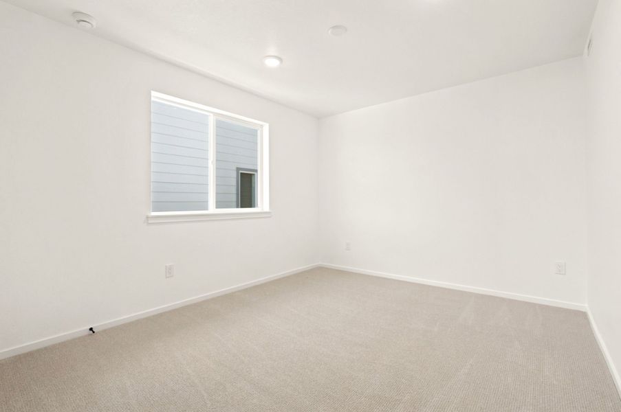 Spacious, unfurnished interior of a new home in Cordovan, Firestone (Image 23).
