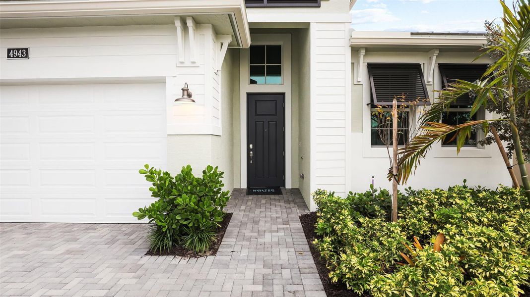 Exterior details and patio area of a home in Cresswind Palm Beach at Westlake, Westlake (Image 30).