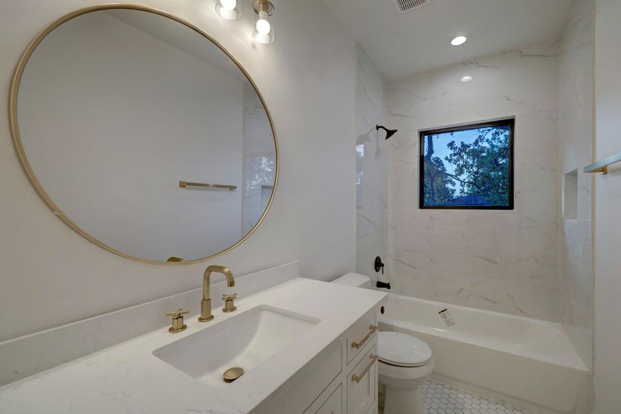 Secondary bath*photos are of a previously constructed home by the builder. 1527 Hewitt may have different selections at builders sole discretion. These photos are not meant to be an exact representation of 1527 Hewitt.