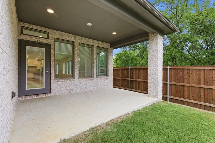 Exterior details and patio area of a home in Prairie Oaks, Oak Point (Image 3). Exterior details and patio area of a home in Prairie Oaks, Oak Point (Image 3).