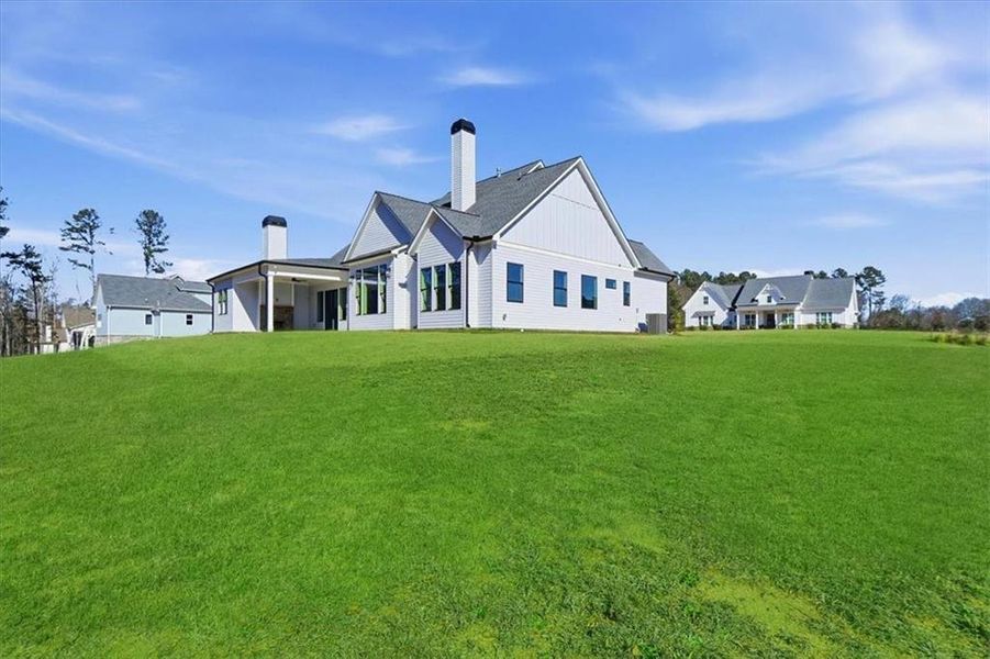 Exterior details and patio area of a home in Old Town Estates, Dacula (Image 29).