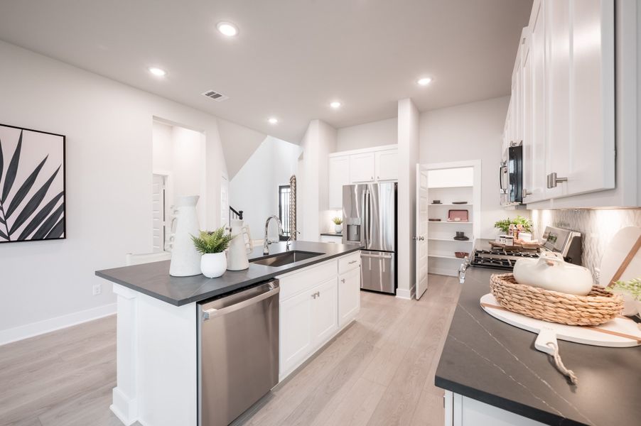 Representative furnished interior of a home built from the Cormorant by Tri Pointe Homes in Trillium, Richmond (Image 10).