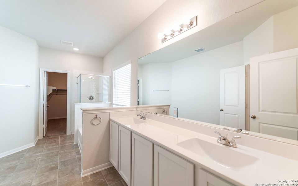 Furnished interior view inside a new home in Hennersby Hollow, San Antonio (Image 6).