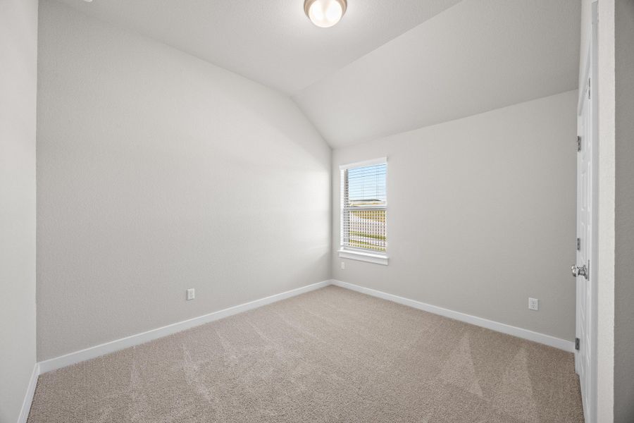 Bedroom in the Cypress home plan by Trophy Signature Homes - REPRESENTATIVE PHOTO Bedroom in the Cypress home plan by Trophy Signature Homes - REPRESENTATIVE PHOTO