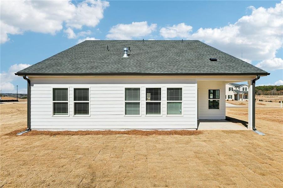 Exterior details and patio area of a home in River Pointe, Monroe (Image 21).