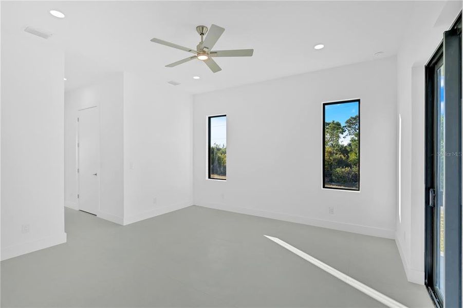 Spacious, unfurnished interior of a new home in , Port Charlotte (Image 42).
