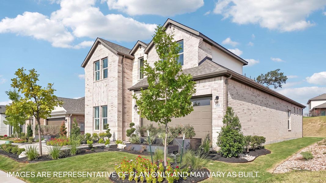 Front exterior of a new home in The Enclave at Bar W Ranch, Leander, TX, highlighting curb appeal (Image 2).