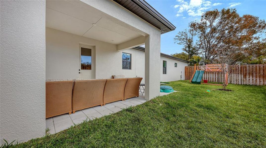 Exterior details and patio area of a home in , Sarasota (Image 22).