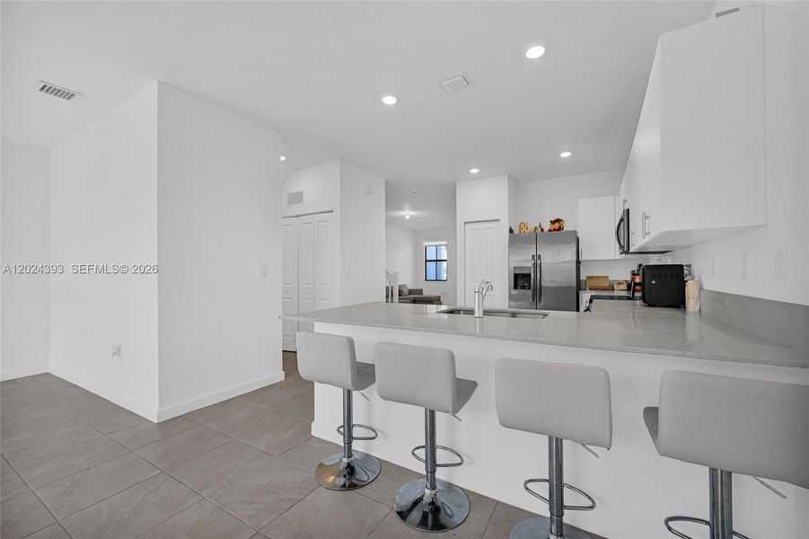Furnished interior view inside a new home in , Miami (Image 15). Furnished interior view inside a new home in , Miami (Image 15).