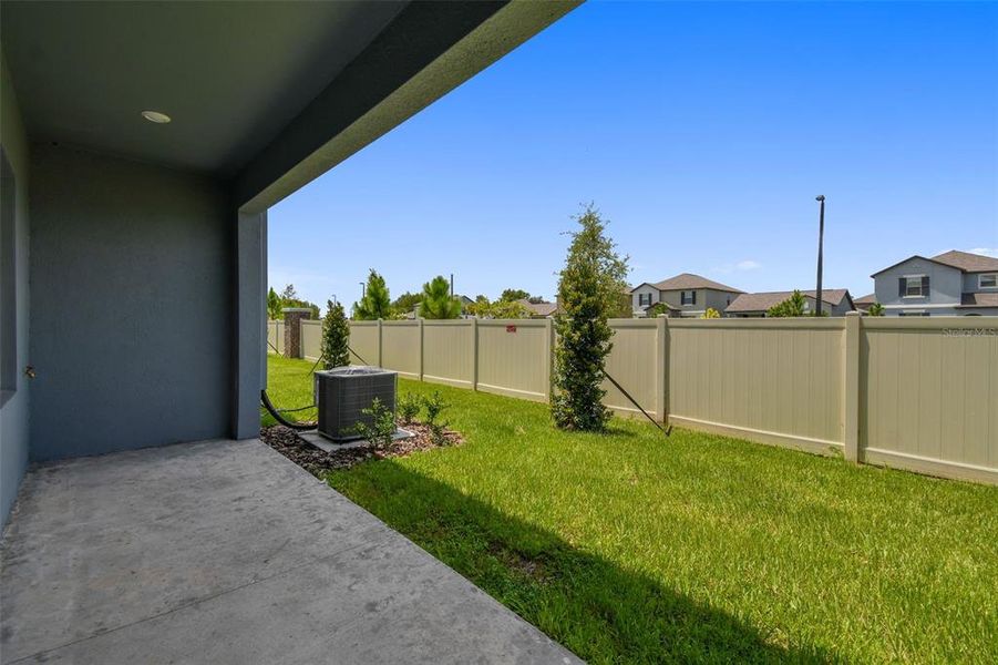 Exterior details and patio area of a home in , Land O' Lakes (Image 27).