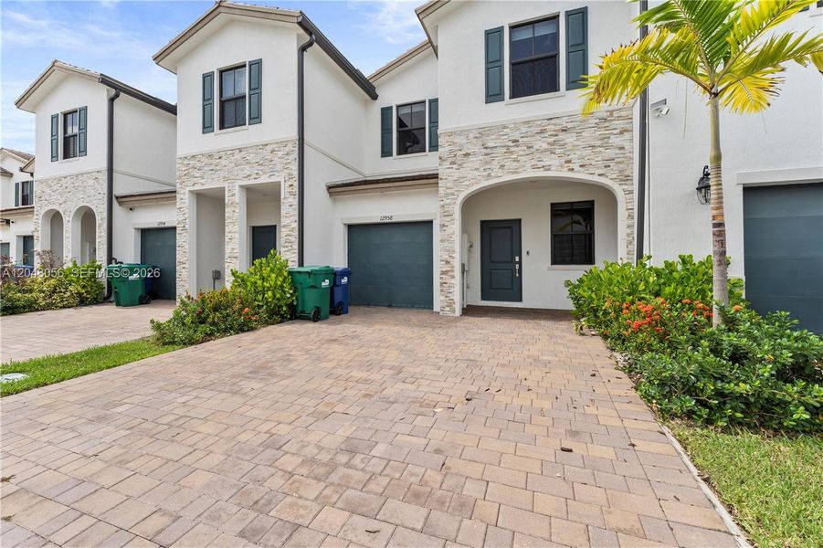 Front exterior of a new home in , Miami, FL, highlighting curb appeal (Image 22). Front exterior of a new home in , Miami, FL, highlighting curb appeal (Image 22).