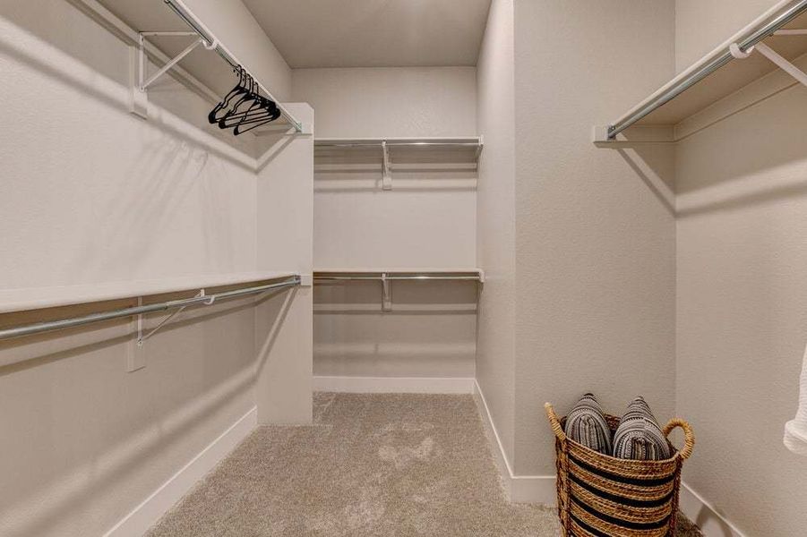 Primary Closet - Not Actual Home - Finishes May Vary