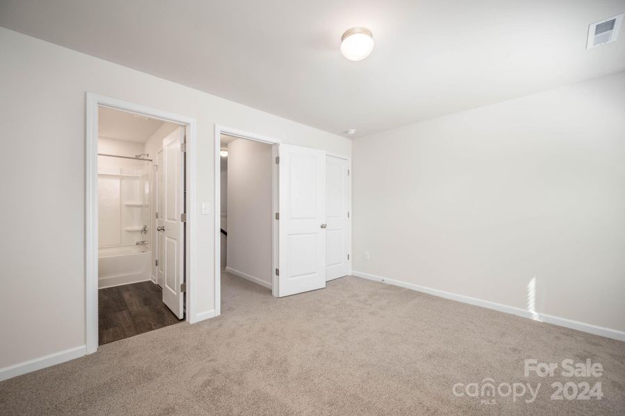 Bedroom 4 on upper level with full bath