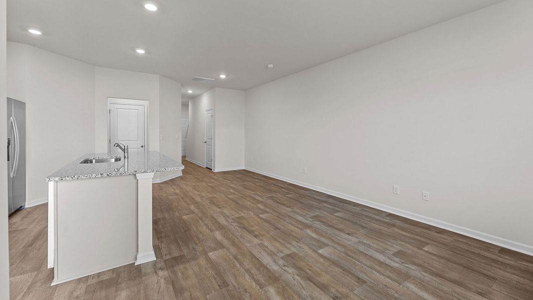 Spacious, unfurnished interior of a new home in The Townes at Ridgewood Farms, Winterville (Image 11).