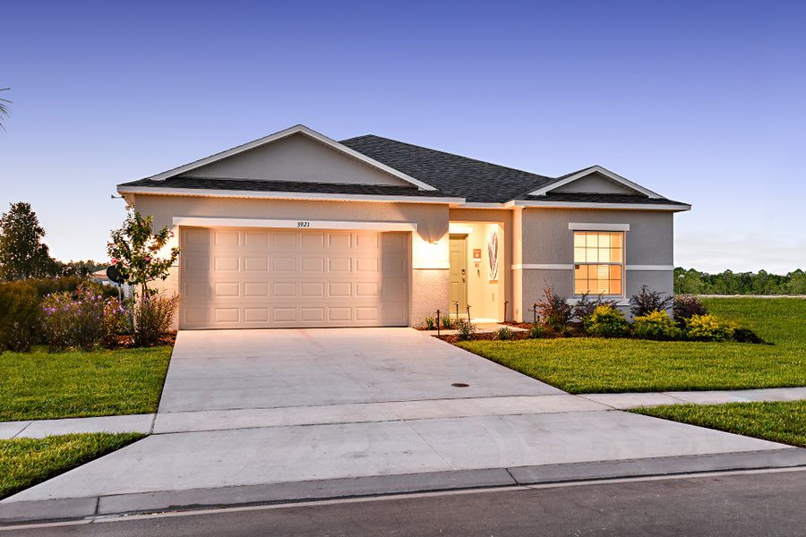 Representative exterior photo of a completed home built from the Goldfinch by Taylor Morrison in Solena, North Fort Myers, FL (Image 9).